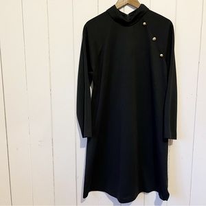 Elegant Black Dress with Gold Button Accents